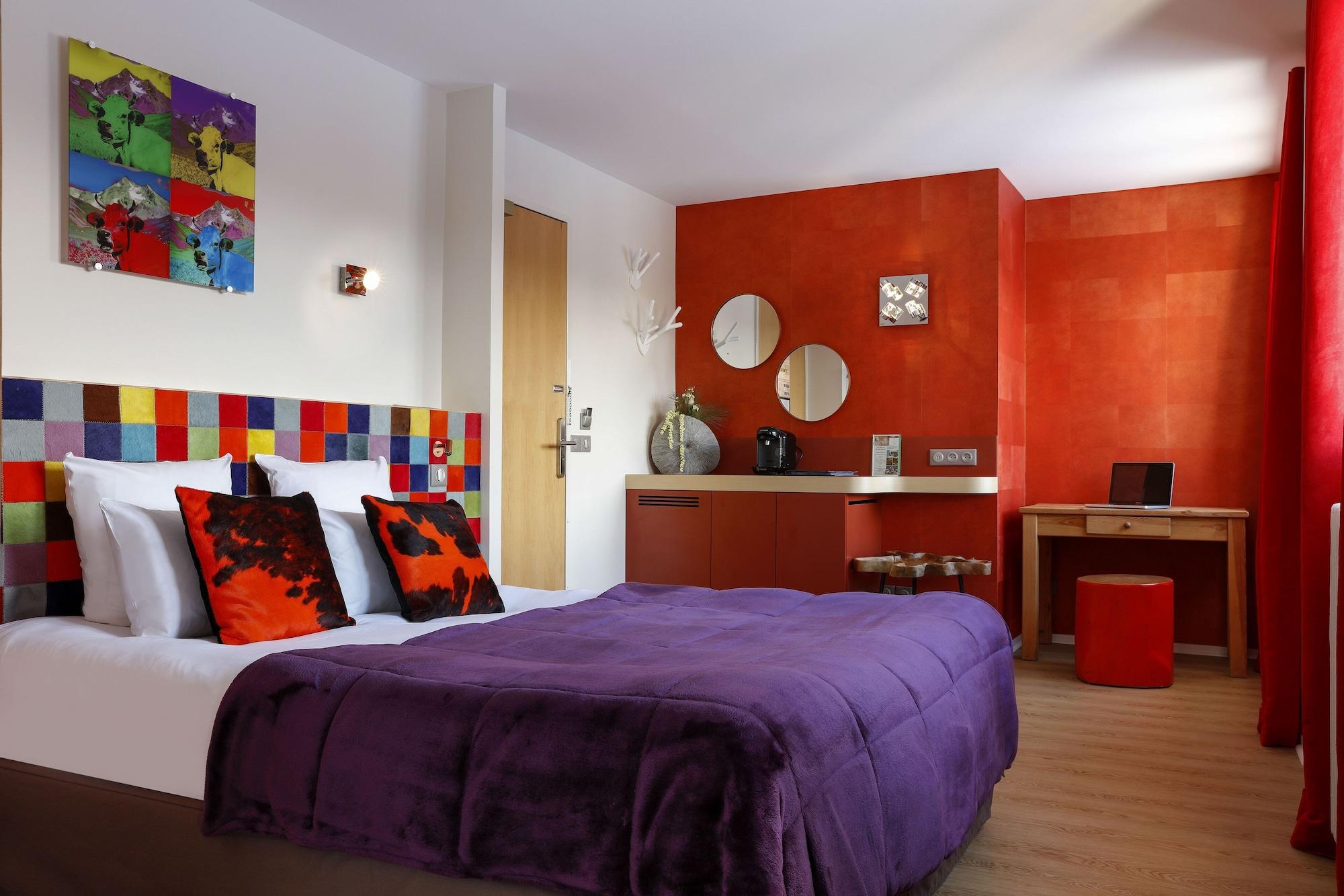 Grandes Rousses Hotel & Spa Alpe d'Huez Exterior foto A typical room at the hotel