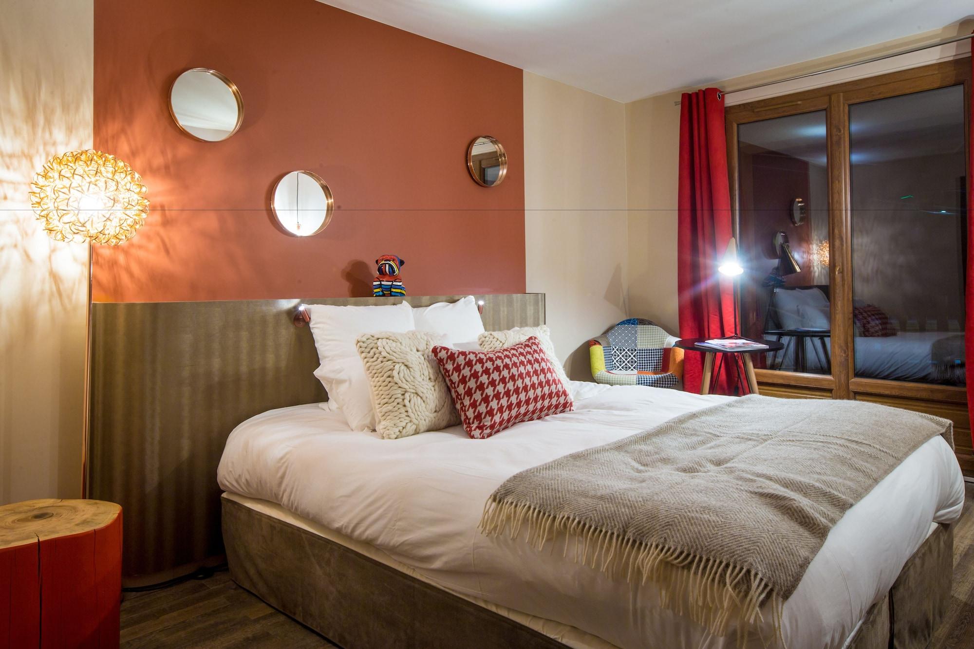 Grandes Rousses Hotel & Spa Alpe d'Huez Exterior foto A bedroom at the hotel