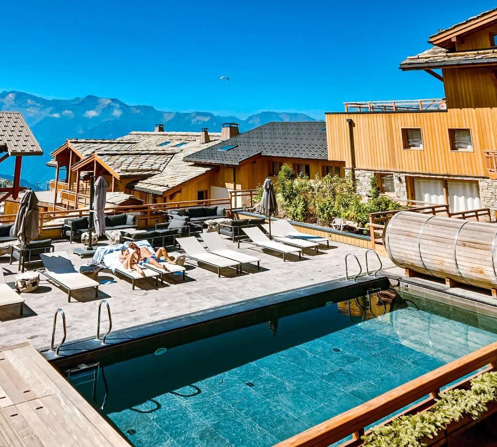 Grandes Rousses Hotel & Spa Alpe d'Huez Exterior foto The swimming pool at the 7132 Summit