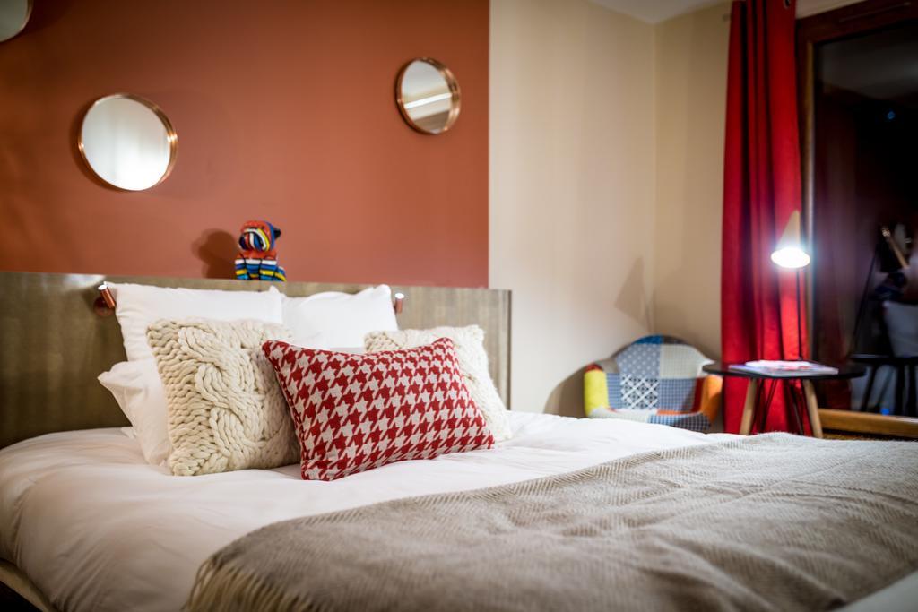 Grandes Rousses Hotel & Spa Alpe d'Huez Exterior foto A bedroom at the hotel
